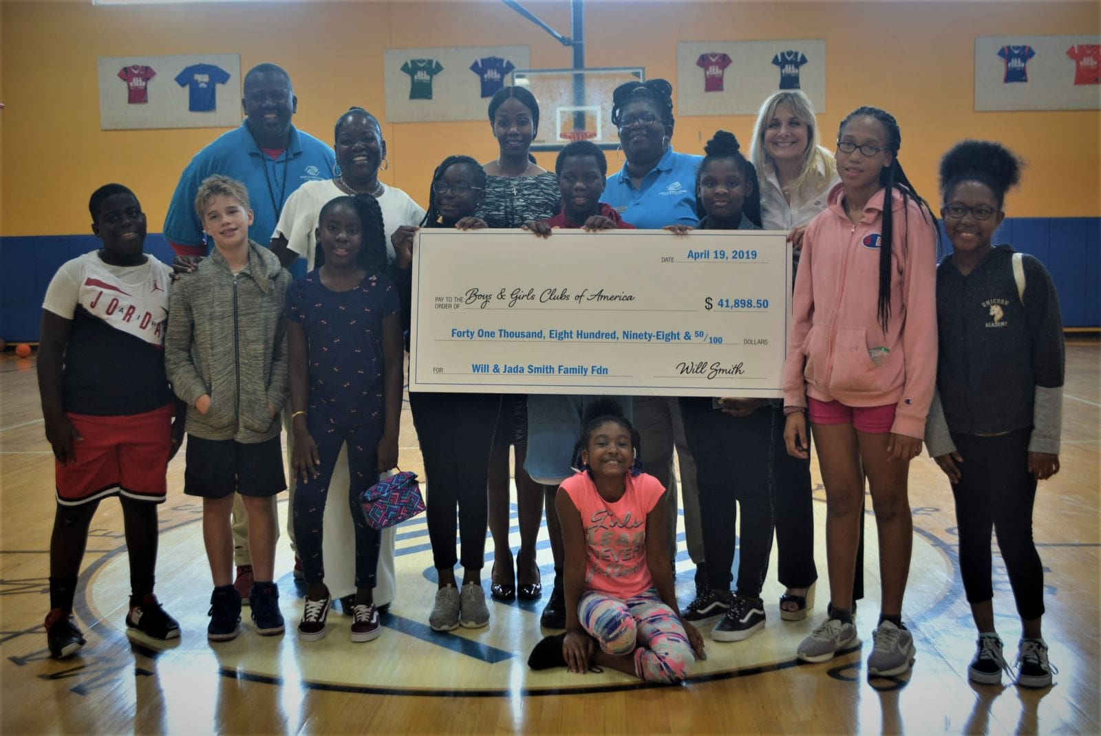 Official photo with check-Ellen Smith visit BGCPBC
