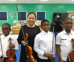 Music teach and 3 students